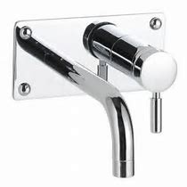 Single lever basin mixer wall mounted